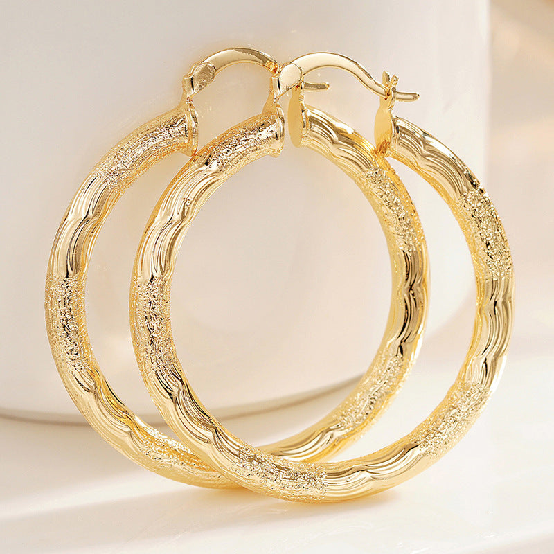Circular Jewelry With Wave-pattern Design Exuding A Chic French Vibe In Earring Clips