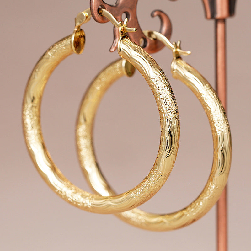 Circular Jewelry With Wave-pattern Design Exuding A Chic French Vibe In Earring Clips